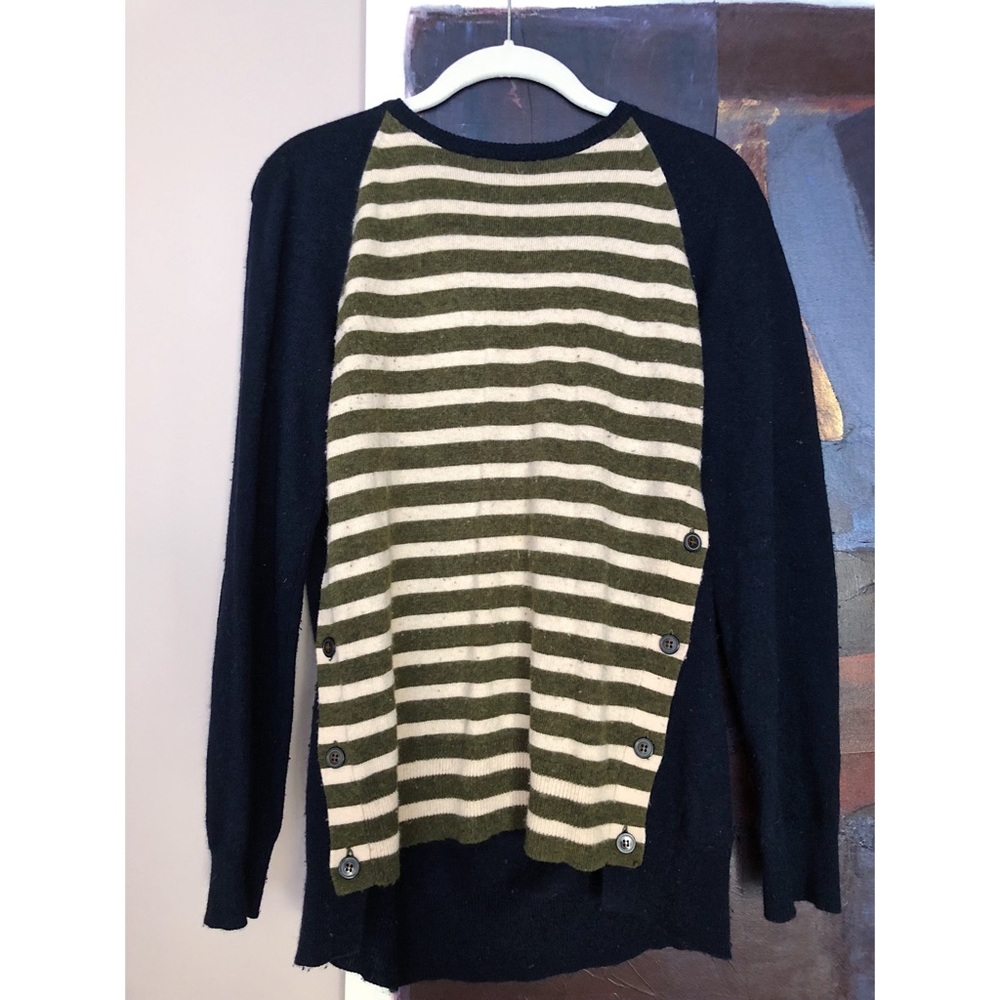 green and white striped blue sweater